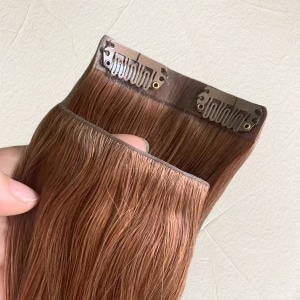 Invsiible clip in hair extensions 